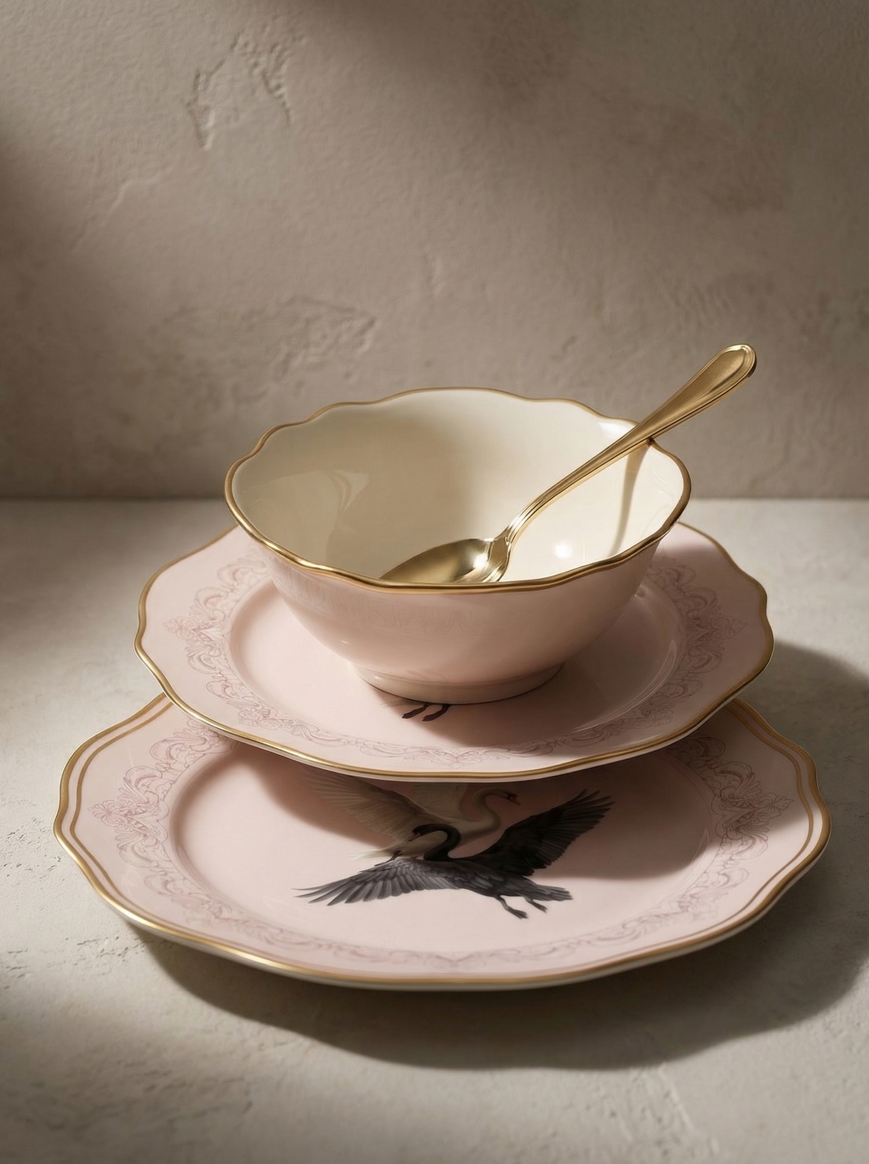 AI-generated product visual of a stacked bird-pattern bowl, plate, and spoon set with gold trim