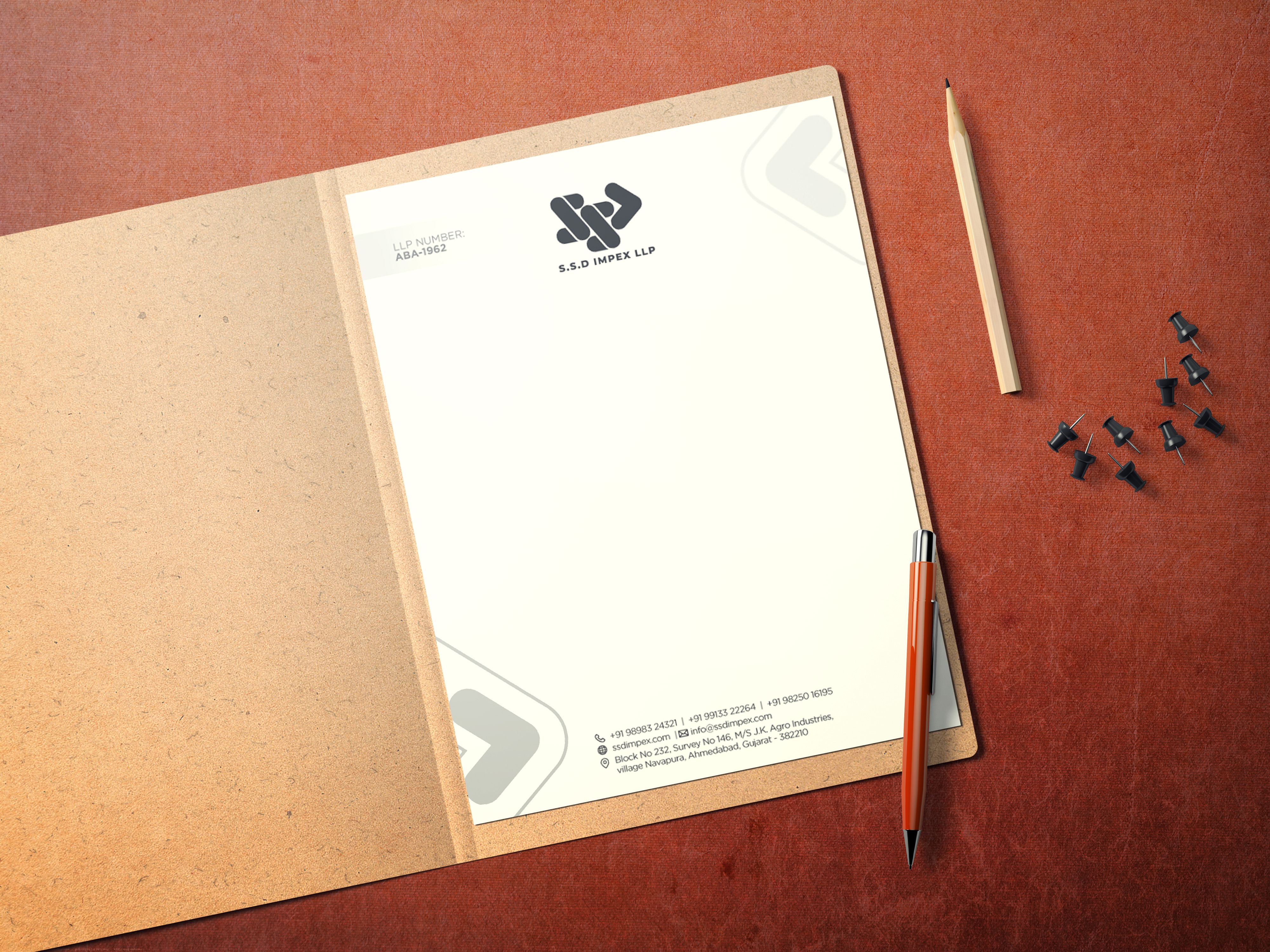 Letterhead design mockup in a kraft folder with pencil and paperclips