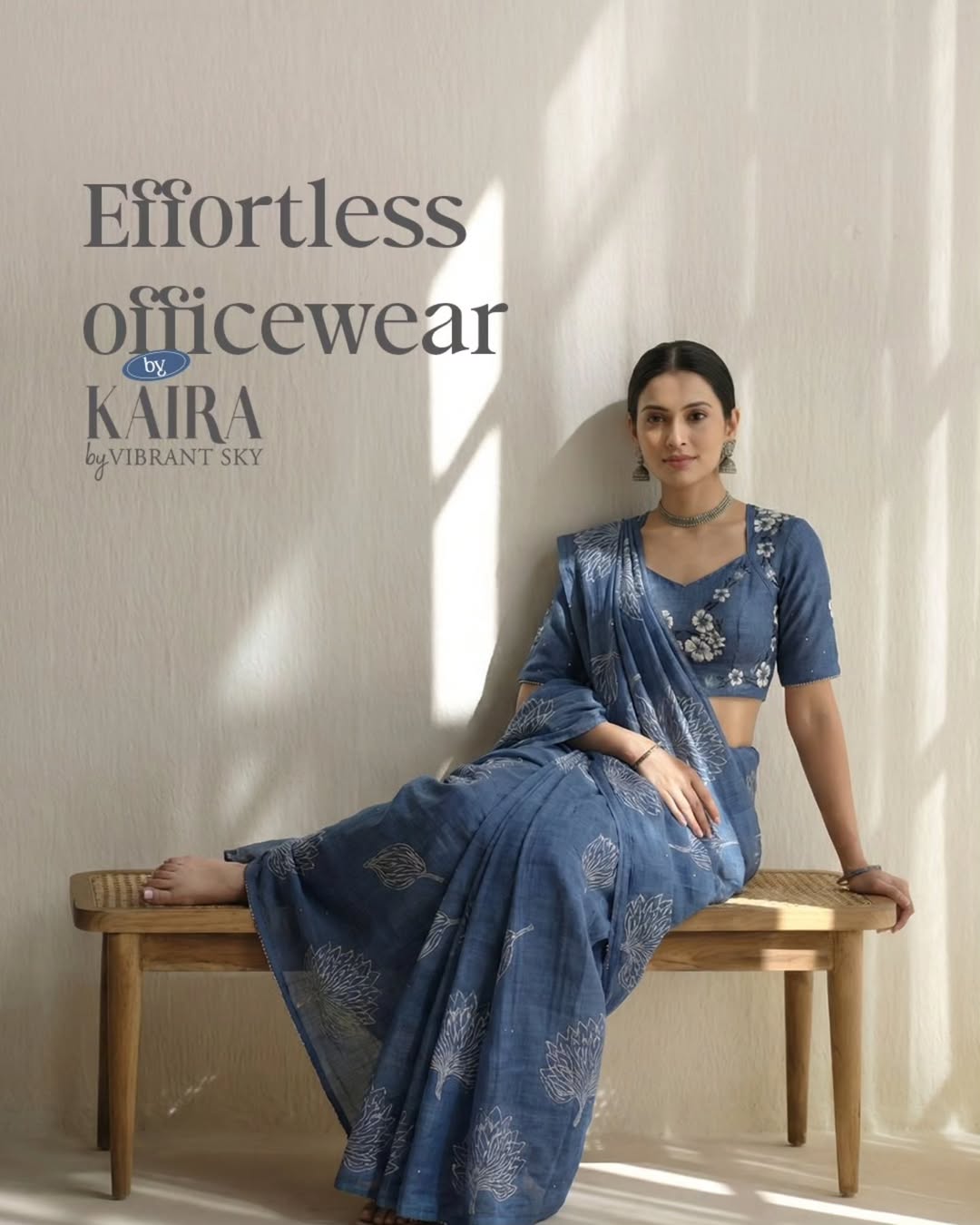 Social media post design for Kaira featuring a woman in blue officewear saree