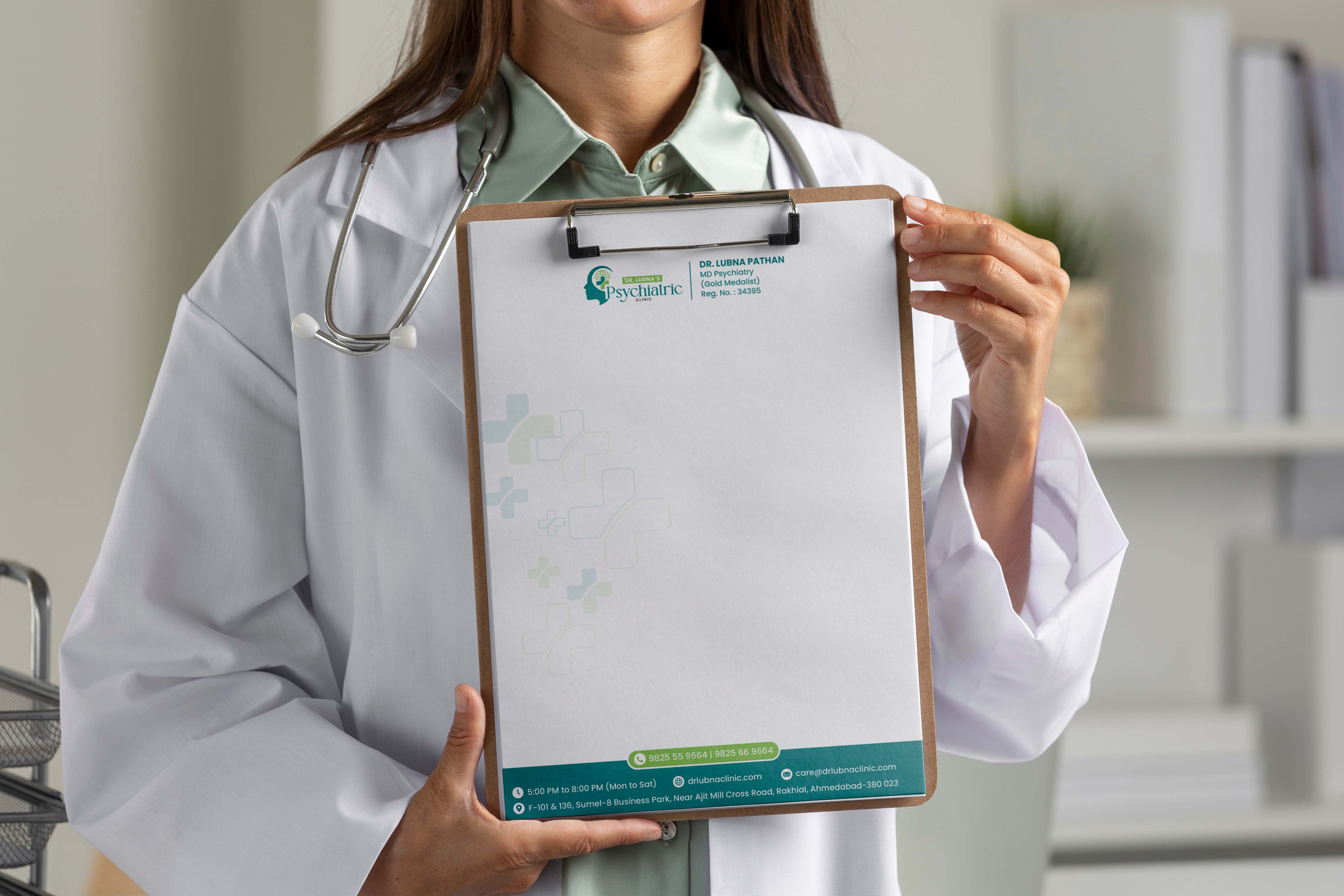 Branded clipboard mockup held by a doctor, medical practice identity design