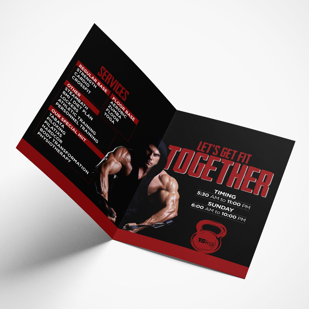 Open brochure design spread showing a gym's class schedule and services